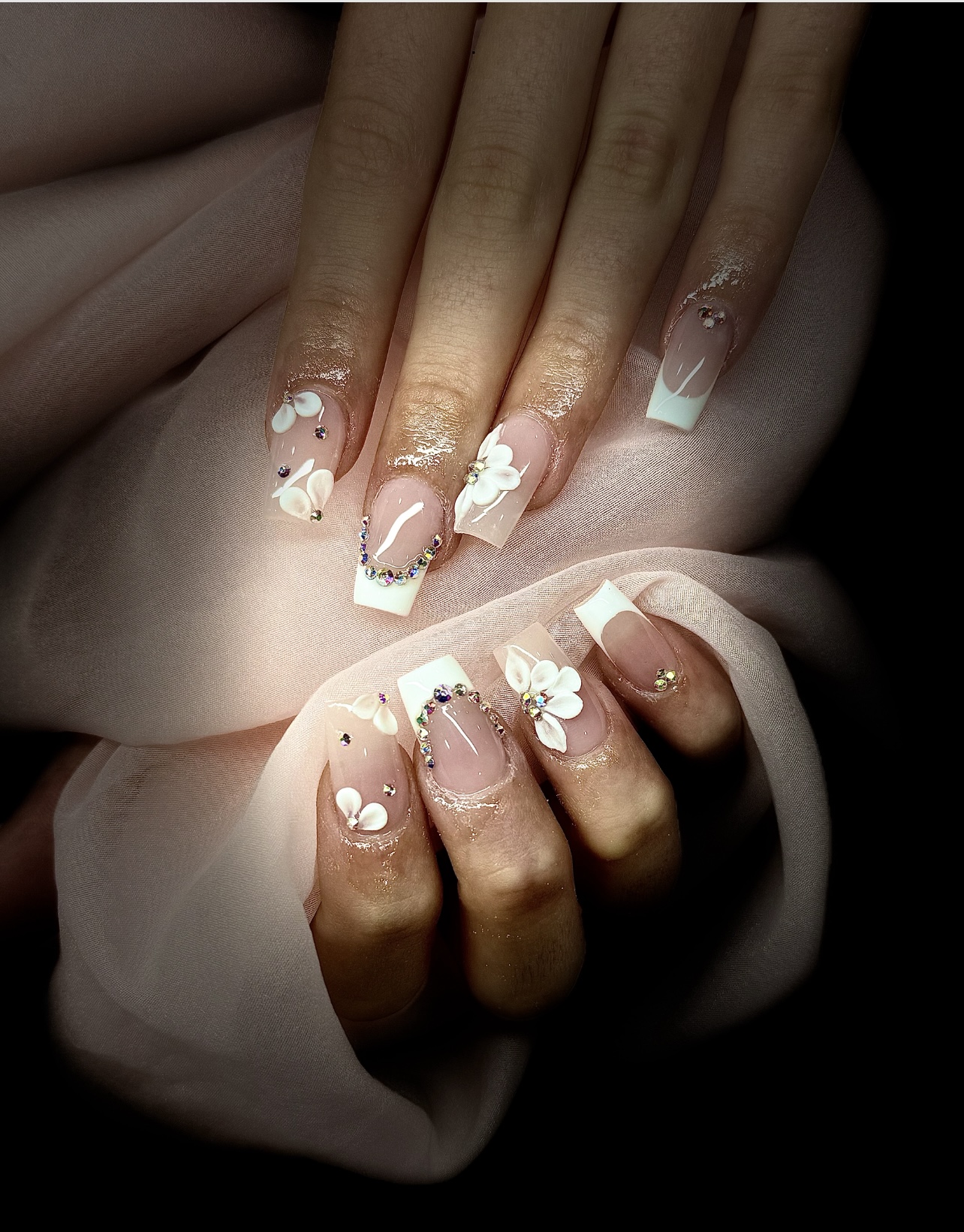 Glossy nude and white French set with 3D flowers and rhinestones, coffin shape